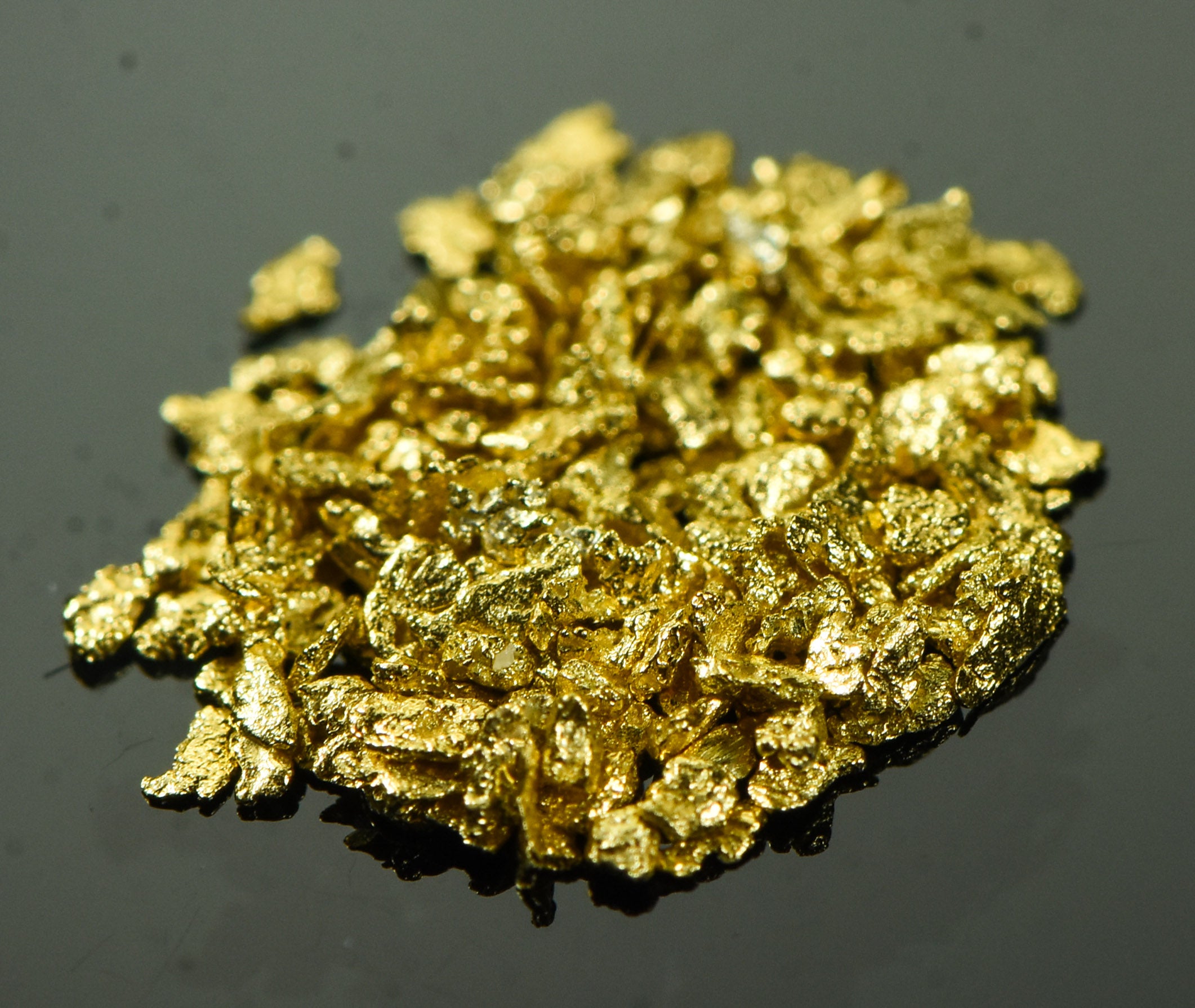NBG_2806_a04e1c81-be21-452d-8c70-ecea888d30e6.jpg Alaskan Yukon Gold Rush Nuggets #20 Mesh .025 Troy Oz.78 Grams or 1/2 DWT - Image 1