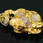 #1 Australian Natural Gold Nugget With Quartz Weighs .94 Grams.